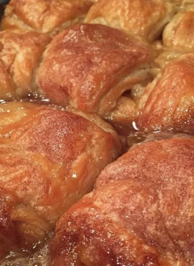 Homemade apple dumplings baked with cinnamon and sugar, a cozy fall treat.