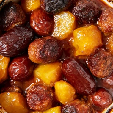 Slow cooker meatball pineapple smokies recipe served in a bowl