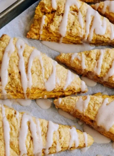 Delicious cozy sourdough pumpkin scones topped with spices