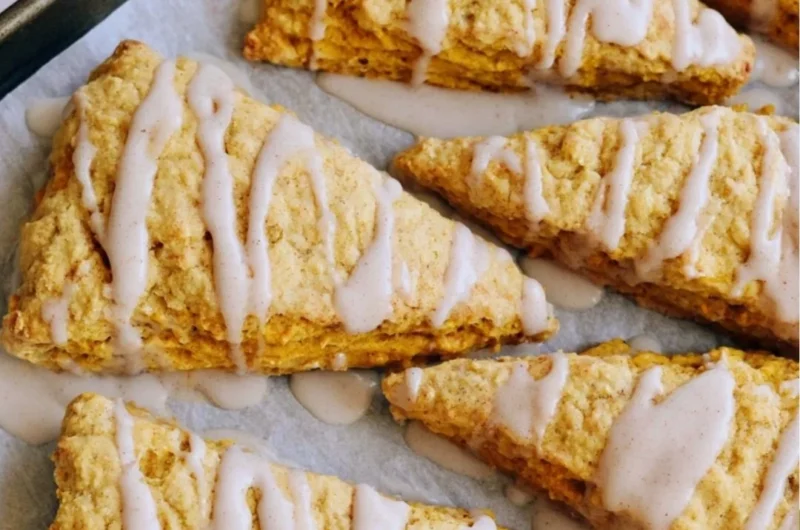 Delicious cozy sourdough pumpkin scones topped with spices