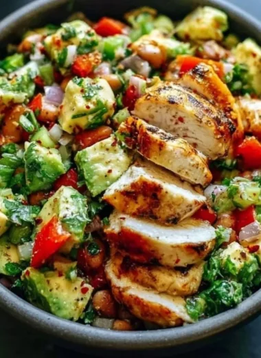 Creamy avocado chicken salad with fresh ingredients in a bowl