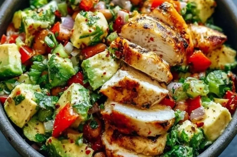 Creamy avocado chicken salad with fresh ingredients in a bowl