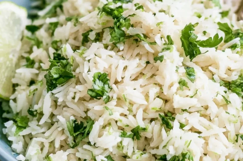Bowl of cilantro lime rice served in a vibrant dish, capturing Chipotle's famous flavor.