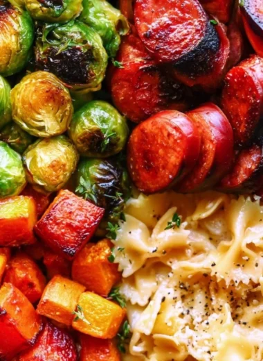 Autumn dinner plate with sausage, pasta, Brussels sprouts, and butternut squash.