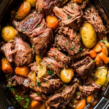 Delicious chuck roast cooking in a crock pot for a cozy meal