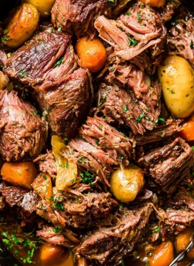Delicious chuck roast cooking in a crock pot for a cozy meal