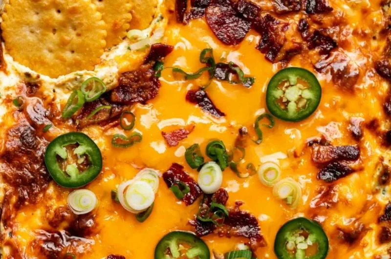 Creamy jalapeno popper dip served in a bowl with chips
