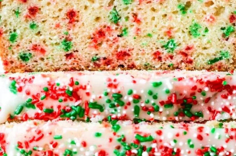 Sliced festive Christmas sprinkle buttermilk bread decorated with colorful sprinkles.