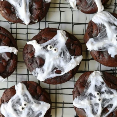 Delicious Halloween double chocolate spider web cookies decorated with icing.