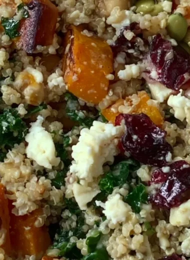 Warm Harvest Quinoa Bowl with fresh vegetables and spices