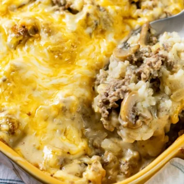 Cheesy ground beef and rice casserole served in a dish