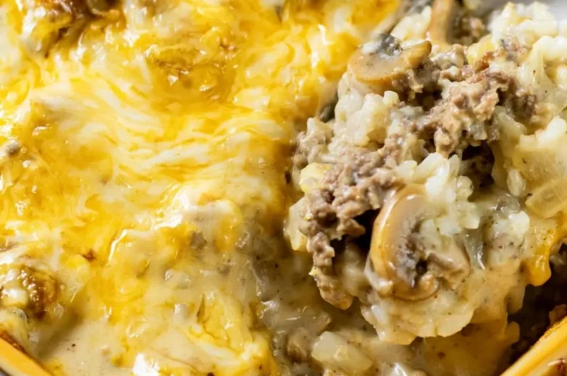 Cheesy ground beef and rice casserole served in a dish