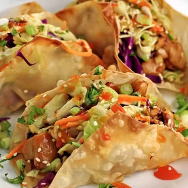 Crispy chicken wonton tacos served with fresh toppings