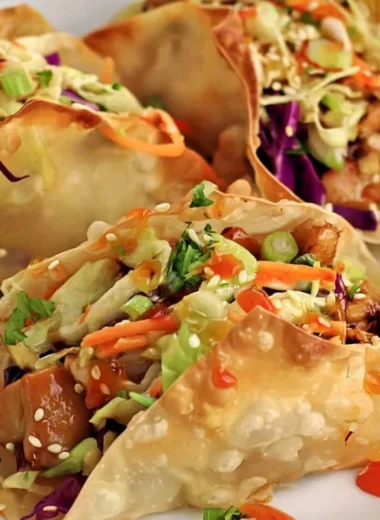 Crispy chicken wonton tacos served with fresh toppings