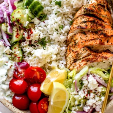 Delicious Greek Chicken Bowls made with fresh ingredients and Mediterranean flavors.