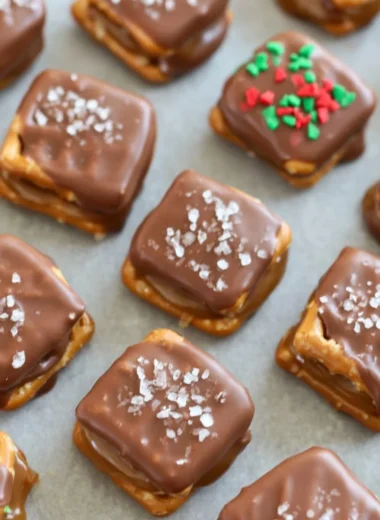 Salted caramel chocolate pretzels topped with sea salt, a perfect festive dessert.