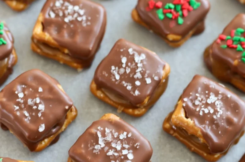 Salted caramel chocolate pretzels topped with sea salt, a perfect festive dessert.